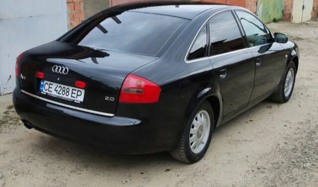 Чорний Ауді 100, об'ємом двигуна 2 л та пробігом 340 тис. км за 6900 $, фото 2 на Automoto.ua