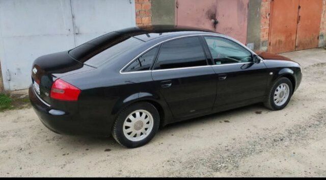 Чорний Ауді 100, об'ємом двигуна 2 л та пробігом 340 тис. км за 6900 $, фото 3 на Automoto.ua