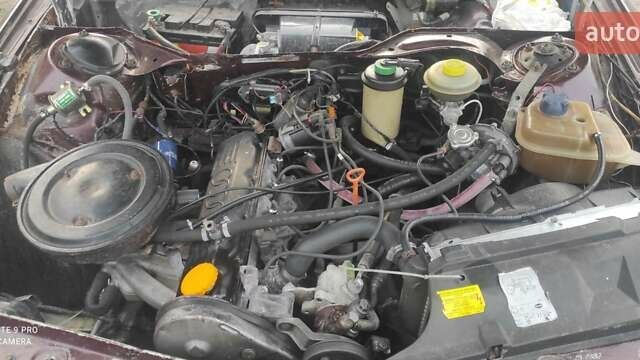 Красный Ауди 100, объемом двигателя 2 л и пробегом 280 тыс. км за 1500 $, фото 1 на Automoto.ua