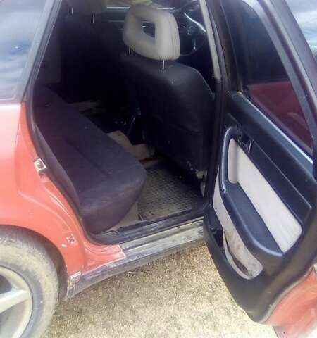 Червоний Ауді 100, об'ємом двигуна 2 л та пробігом 322 тис. км за 3099 $, фото 1 на Automoto.ua