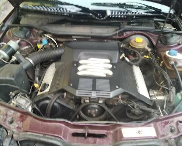 Красный Ауди 100, объемом двигателя 2.6 л и пробегом 391 тыс. км за 2700 $, фото 2 на Automoto.ua