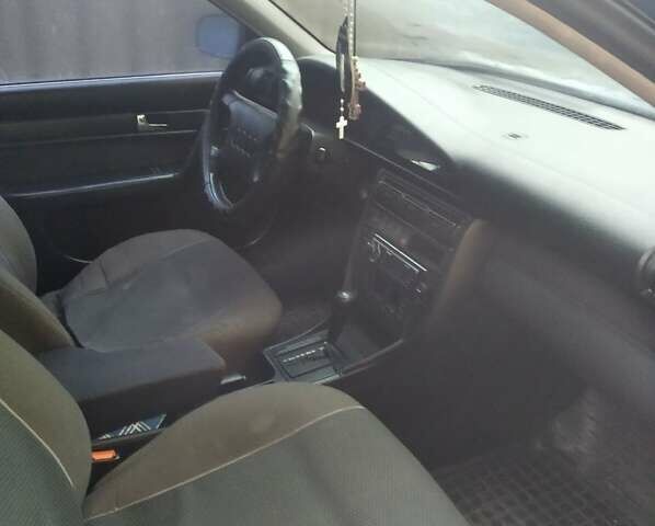 Красный Ауди 100, объемом двигателя 2.6 л и пробегом 391 тыс. км за 2700 $, фото 1 на Automoto.ua