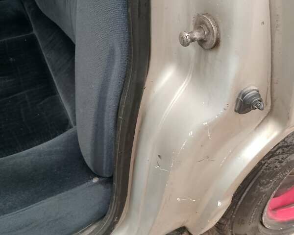 Серый Ауди 100, объемом двигателя 2 л и пробегом 263 тыс. км за 1600 $, фото 2 на Automoto.ua