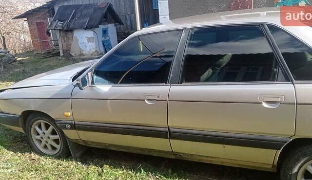 Сірий Ауді 100, об'ємом двигуна 2.2 л та пробігом 300 тис. км за 1800 $, фото 1 на Automoto.ua