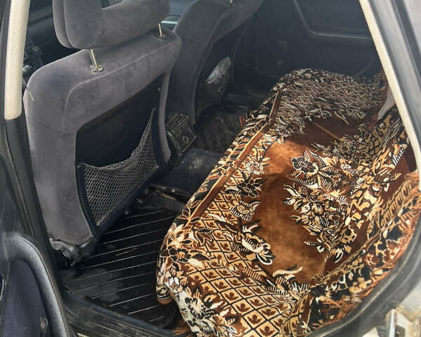 Серый Ауди 100, объемом двигателя 1.98 л и пробегом 238 тыс. км за 2000 $, фото 1 на Automoto.ua