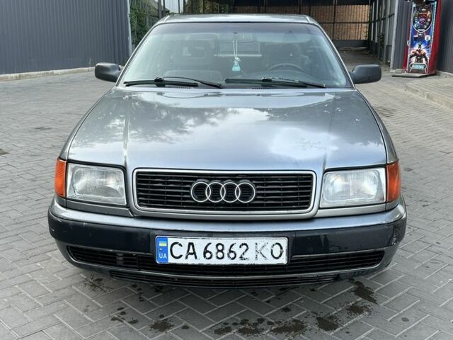 Сірий Ауді 100, об'ємом двигуна 2 л та пробігом 439 тис. км за 1995 $, фото 1 на Automoto.ua