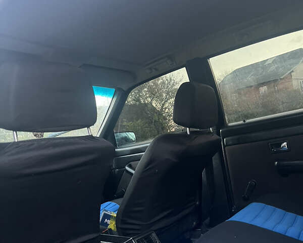 Синій Ауді 100, об'ємом двигуна 2 л та пробігом 300 тис. км за 1399 $, фото 5 на Automoto.ua