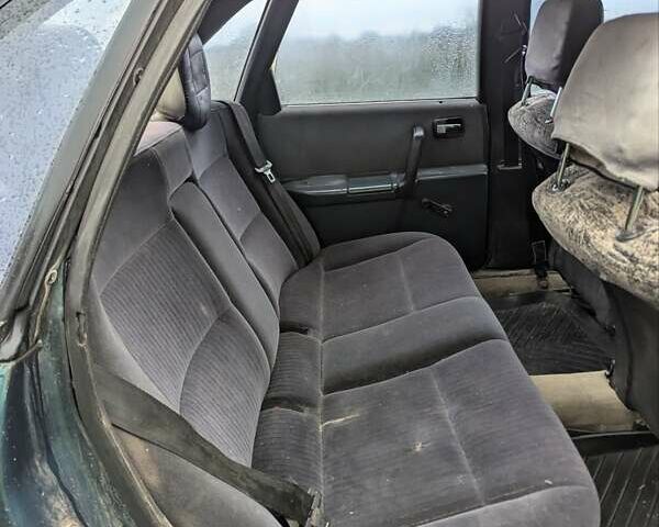 Зеленый Ауди 100, объемом двигателя 1.97 л и пробегом 370 тыс. км за 1150 $, фото 1 на Automoto.ua