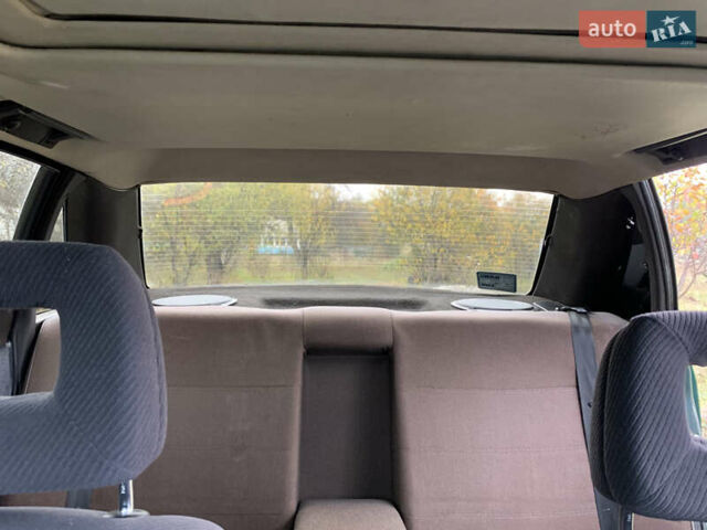 Зеленый Ауди 100, объемом двигателя 1.78 л и пробегом 338 тыс. км за 1500 $, фото 11 на Automoto.ua