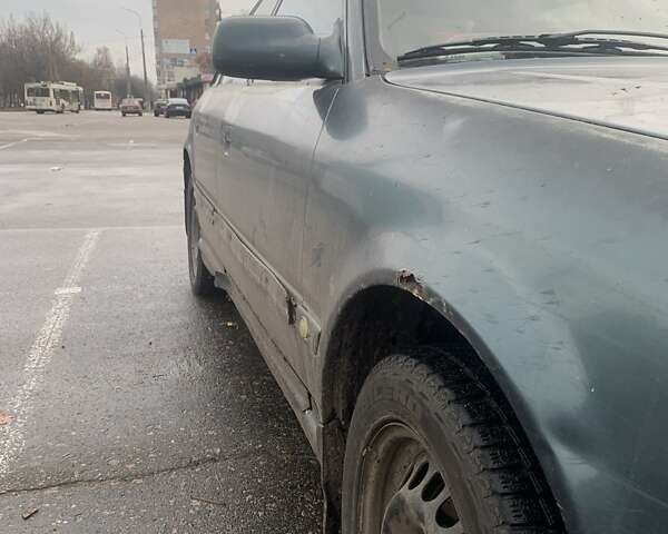 Зеленый Ауди 100, объемом двигателя 2 л и пробегом 200 тыс. км за 1650 $, фото 1 на Automoto.ua