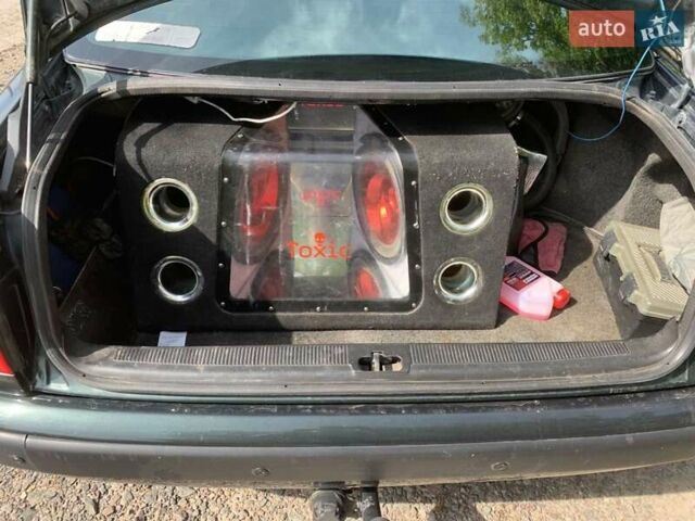 Зеленый Ауди 100, объемом двигателя 1.99 л и пробегом 451 тыс. км за 3400 $, фото 5 на Automoto.ua