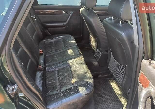 Зеленый Ауди 100, объемом двигателя 2.6 л и пробегом 400 тыс. км за 2700 $, фото 1 на Automoto.ua