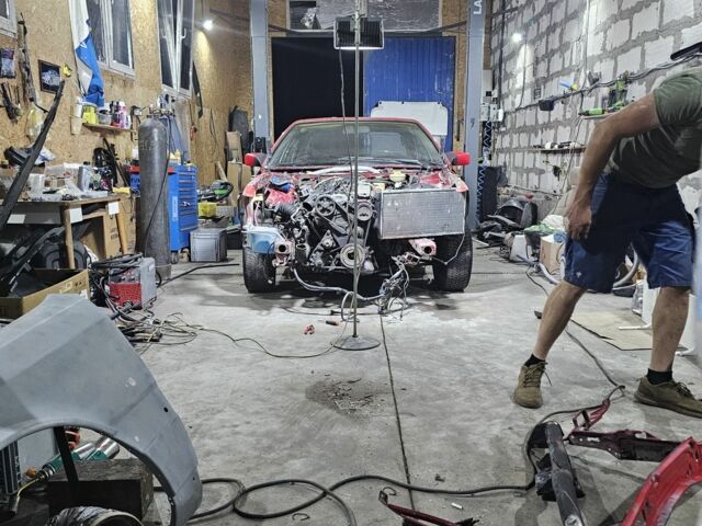 Красный Ауди 200, объемом двигателя 2.2 л и пробегом 300 тыс. км за 4000 $, фото 3 на Automoto.ua