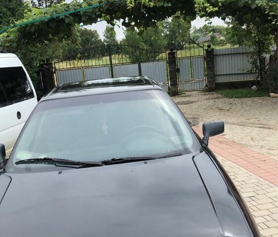 Черный Ауди 80, объемом двигателя 1.8 л и пробегом 300 тыс. км за 1250 $, фото 1 на Automoto.ua