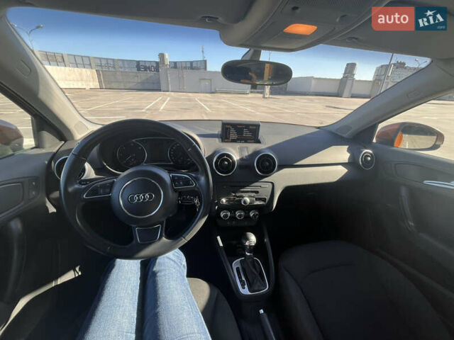 Ауді А1 2013 у Києві на Automoto.ua Помаранчевий Ауді А1, об'ємом двигуна 1.6 л та пробігом 141 тис. км за 13900 $, фото 9 на Automoto.ua
