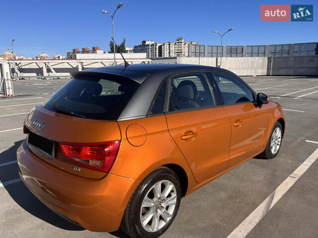Ауді А1 2013 у Києві на Automoto.ua Помаранчевий Ауді А1, об'ємом двигуна 1.6 л та пробігом 141 тис. км за 13900 $, фото 3 на Automoto.ua