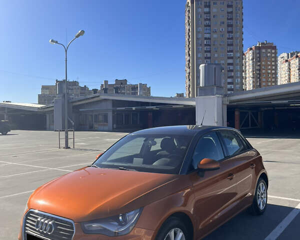 Ауді А1 2013 у Києві на Automoto.ua Помаранчевий Ауді А1, об'ємом двигуна 1.6 л та пробігом 141 тис. км за 13900 $, фото 7 на Automoto.ua