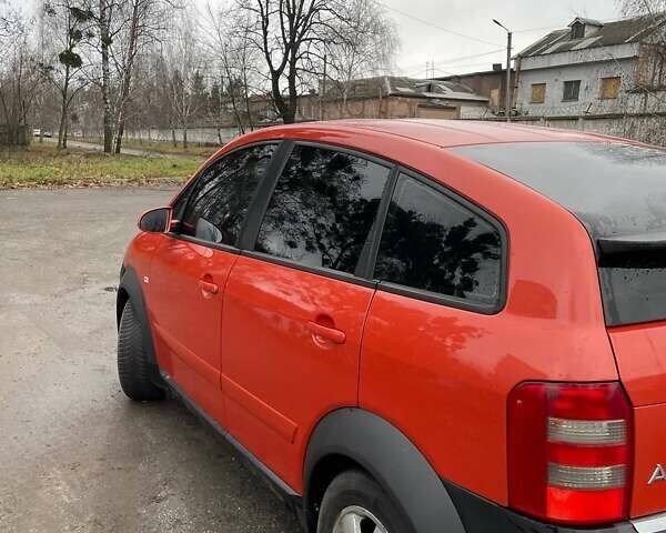 Красный Ауди А2, объемом двигателя 1.4 л и пробегом 238 тыс. км за 4000 $, фото 5 на Automoto.ua