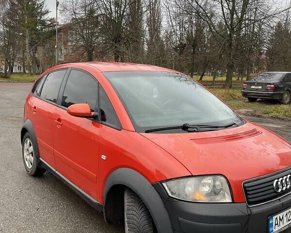 Красный Ауди А2, объемом двигателя 1.4 л и пробегом 238 тыс. км за 4000 $, фото 2 на Automoto.ua