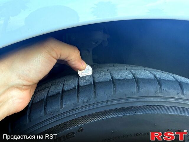 Білий Ауді А4, об'ємом двигуна 2 л та пробігом 209 тис. км за 10800 $, фото 4 на Automoto.ua