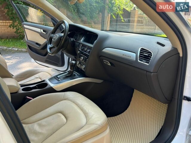 Білий Ауді А4, об'ємом двигуна 2 л та пробігом 208 тис. км за 9500 $, фото 28 на Automoto.ua