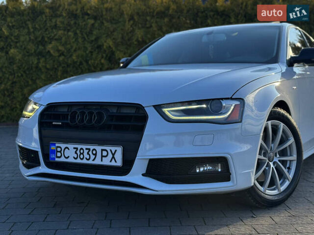 Белый Ауди А4, объемом двигателя 2 л и пробегом 200 тыс. км за 13800 $, фото 2 на Automoto.ua