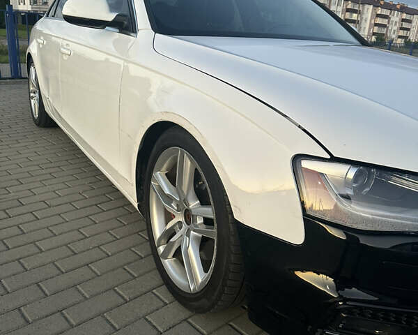 Білий Ауді А4, об'ємом двигуна 2 л та пробігом 243 тис. км за 10500 $, фото 1 на Automoto.ua