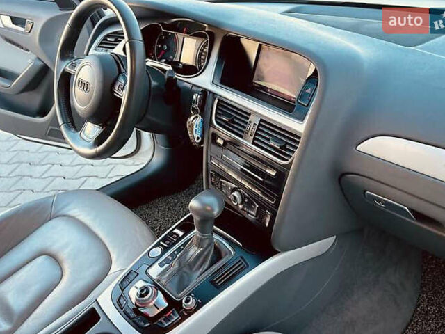 Ауді А4 2015 у Києві на Automoto.ua Білий Ауді А4, об'ємом двигуна 1.97 л та пробігом 143 тис. км за 14400 $, фото 11 на Automoto.ua
