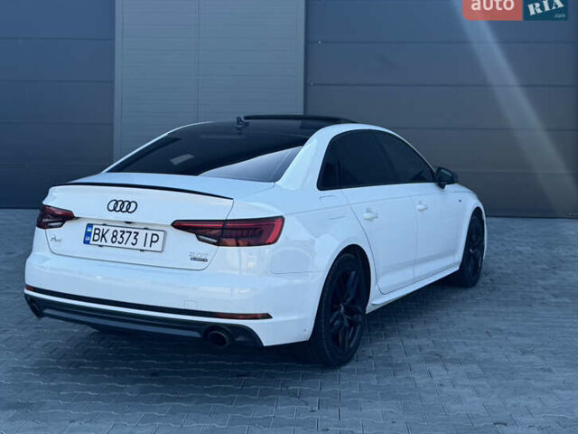 Білий Ауді А4, об'ємом двигуна 2 л та пробігом 194 тис. км за 18000 $, фото 6 на Automoto.ua