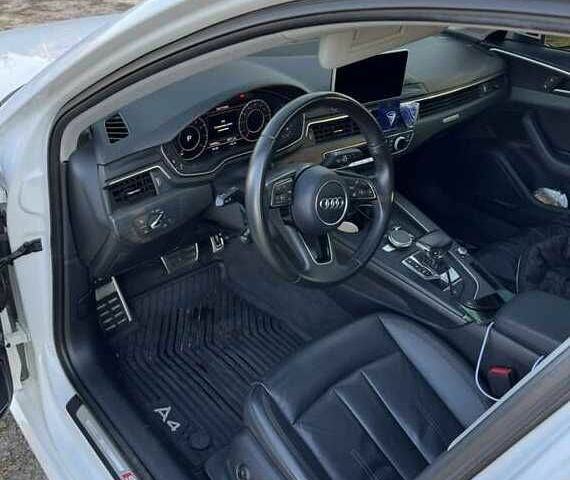 Білий Ауді А4, об'ємом двигуна 2 л та пробігом 128 тис. км за 14700 $, фото 2 на Automoto.ua