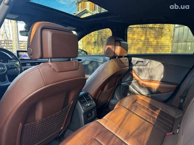 Білий Ауді А4, об'ємом двигуна 2 л та пробігом 146 тис. км за 19990 $, фото 33 на Automoto.ua