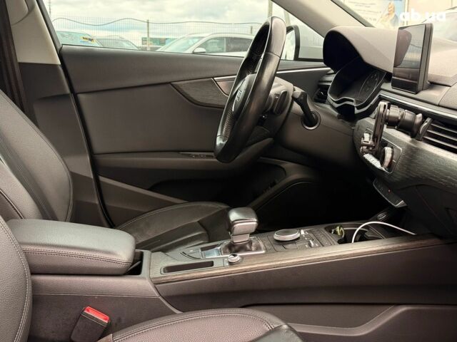 Білий Ауді А4, об'ємом двигуна 2 л та пробігом 143 тис. км за 18790 $, фото 13 на Automoto.ua