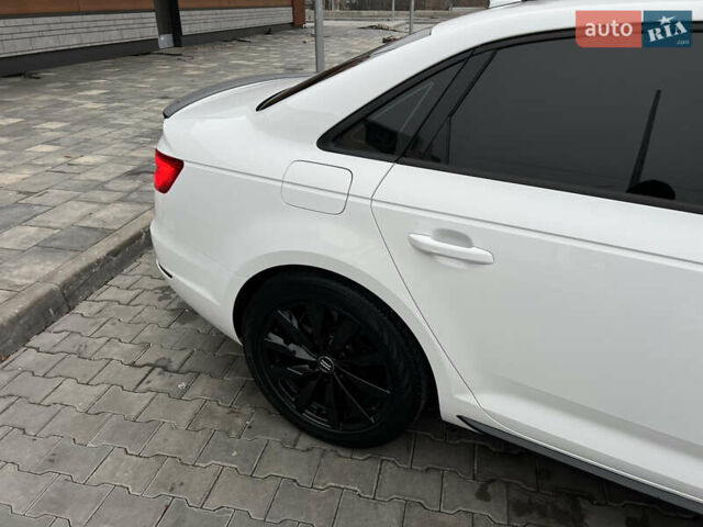 Білий Ауді А4, об'ємом двигуна 2 л та пробігом 84 тис. км за 20000 $, фото 16 на Automoto.ua