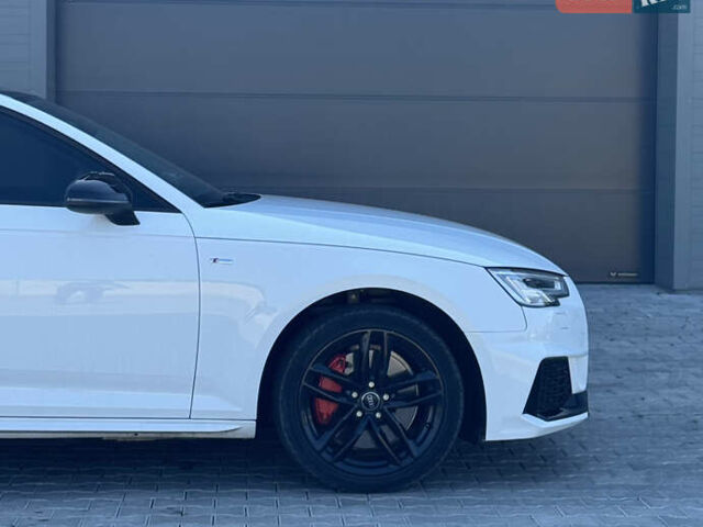 Білий Ауді А4, об'ємом двигуна 2 л та пробігом 194 тис. км за 18000 $, фото 14 на Automoto.ua