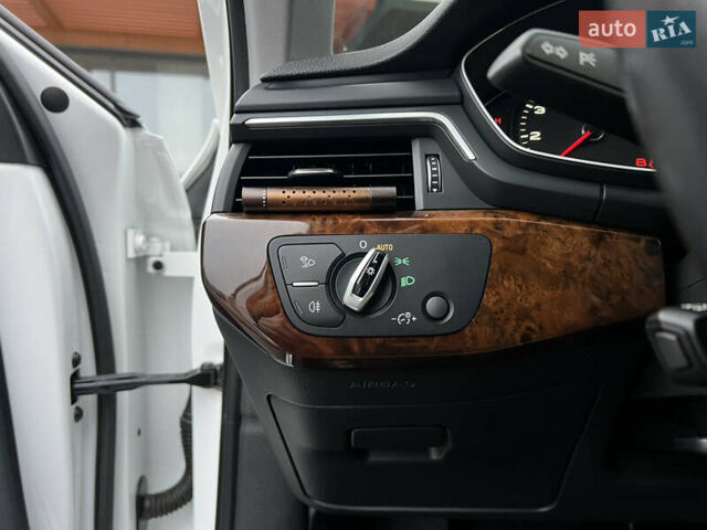 Білий Ауді А4, об'ємом двигуна 2 л та пробігом 84 тис. км за 20000 $, фото 42 на Automoto.ua