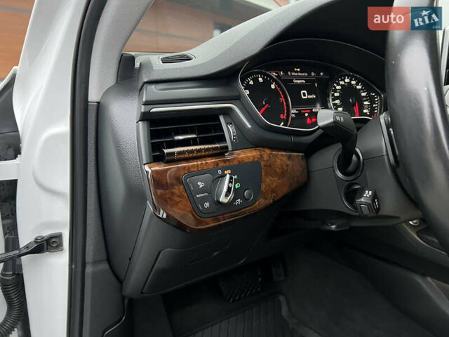 Білий Ауді А4, об'ємом двигуна 2 л та пробігом 84 тис. км за 20000 $, фото 36 на Automoto.ua