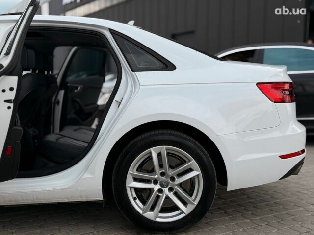 Білий Ауді А4, об'ємом двигуна 2 л та пробігом 143 тис. км за 18790 $, фото 23 на Automoto.ua