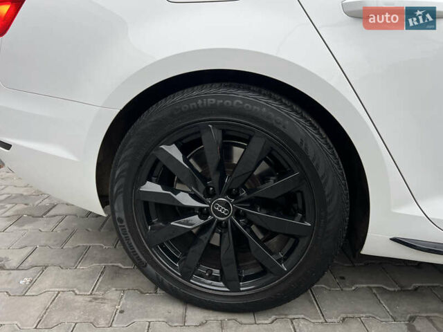 Білий Ауді А4, об'ємом двигуна 2 л та пробігом 84 тис. км за 20000 $, фото 18 на Automoto.ua