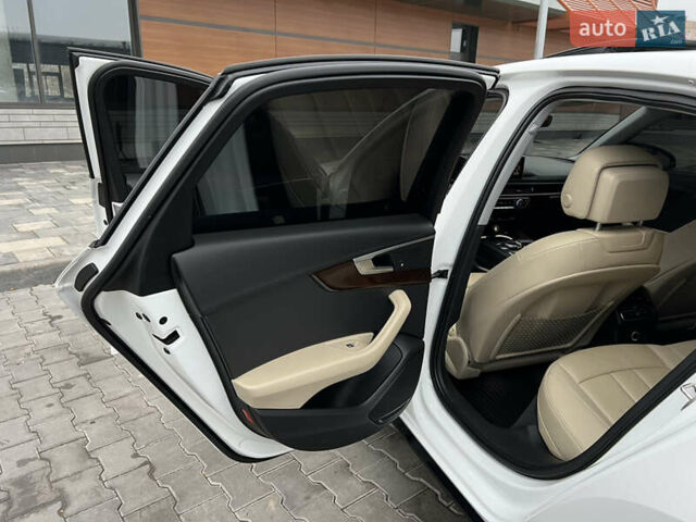 Білий Ауді А4, об'ємом двигуна 2 л та пробігом 84 тис. км за 20000 $, фото 39 на Automoto.ua