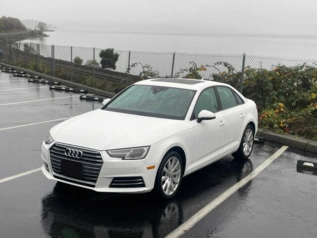 Белый Ауди А4, объемом двигателя 2 л и пробегом 65 тыс. км за 15600 $, фото 2 на Automoto.ua