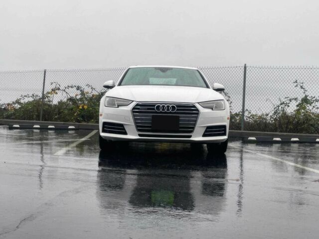 Белый Ауди А4, объемом двигателя 2 л и пробегом 65 тыс. км за 15600 $, фото 1 на Automoto.ua