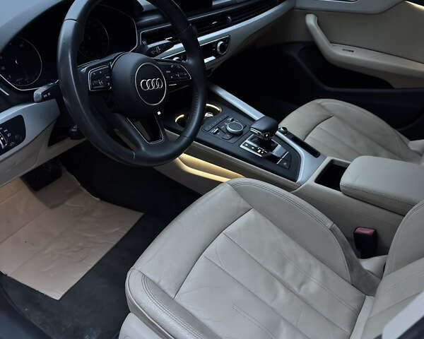 Білий Ауді А4, об'ємом двигуна 1.98 л та пробігом 145 тис. км за 13700 $, фото 7 на Automoto.ua