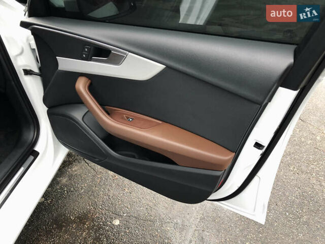 Білий Ауді А4, об'ємом двигуна 2 л та пробігом 173 тис. км за 12345 $, фото 49 на Automoto.ua