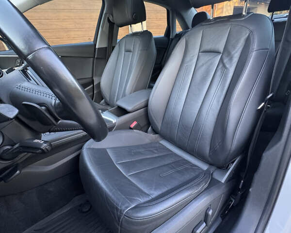 Білий Ауді А4, об'ємом двигуна 2 л та пробігом 209 тис. км за 16700 $, фото 44 на Automoto.ua