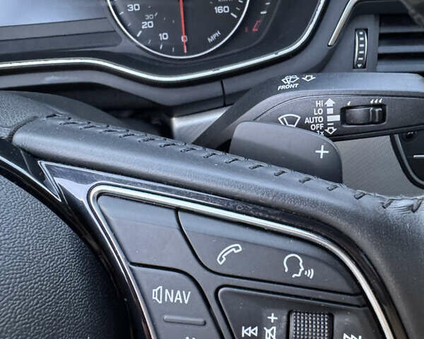 Білий Ауді А4, об'ємом двигуна 2 л та пробігом 209 тис. км за 16700 $, фото 27 на Automoto.ua