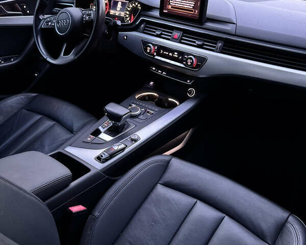 Білий Ауді А4, об'ємом двигуна 2 л та пробігом 209 тис. км за 16700 $, фото 81 на Automoto.ua