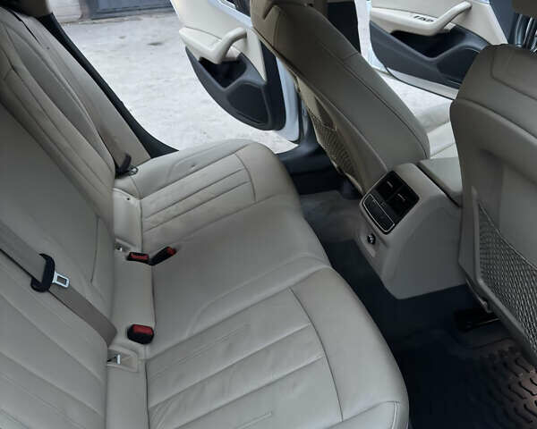 Білий Ауді А4, об'ємом двигуна 1.98 л та пробігом 145 тис. км за 13700 $, фото 18 на Automoto.ua