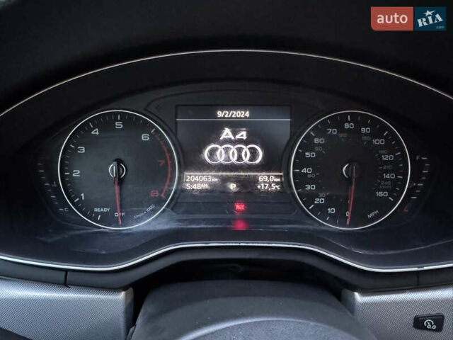 Білий Ауді А4, об'ємом двигуна 2 л та пробігом 209 тис. км за 16700 $, фото 61 на Automoto.ua