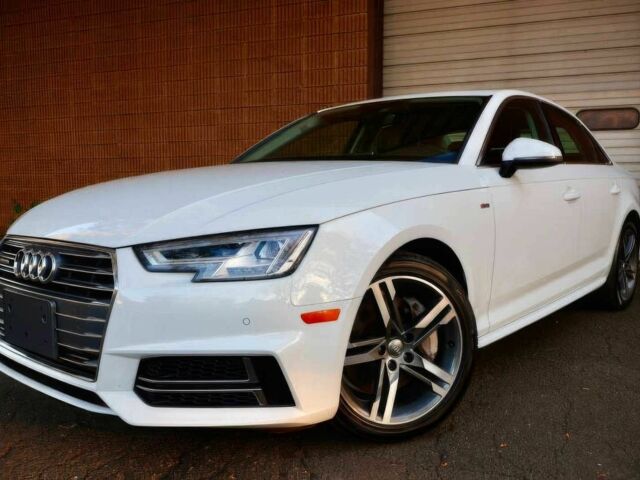 Белый Ауди А4, объемом двигателя 2 л и пробегом 68 тыс. км за 12999 $, фото 2 на Automoto.ua