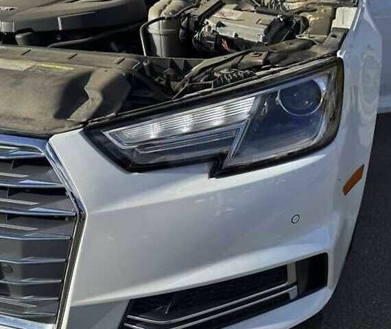 Білий Ауді А4, об'ємом двигуна 2 л та пробігом 100 тис. км за 18000 $, фото 5 на Automoto.ua